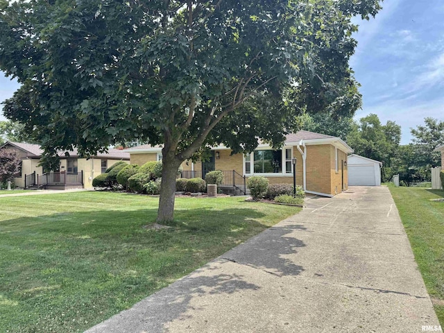 161 Hawkinson Ave, Galesburg, IL 61401 - view of front of house with brick siding, a front yard, an outbuilding, and a detached garage