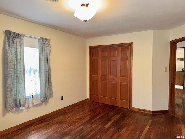 161 Hawkinson Ave, Galesburg, IL 61401 - unfurnished bedroom featuring wood finished floors and a closet