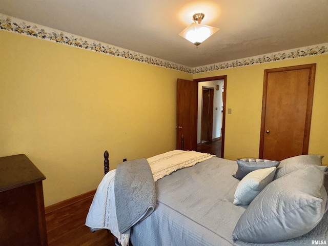 161 Hawkinson Ave, Galesburg, IL 61401 - bedroom featuring dark wood-style floors and baseboards