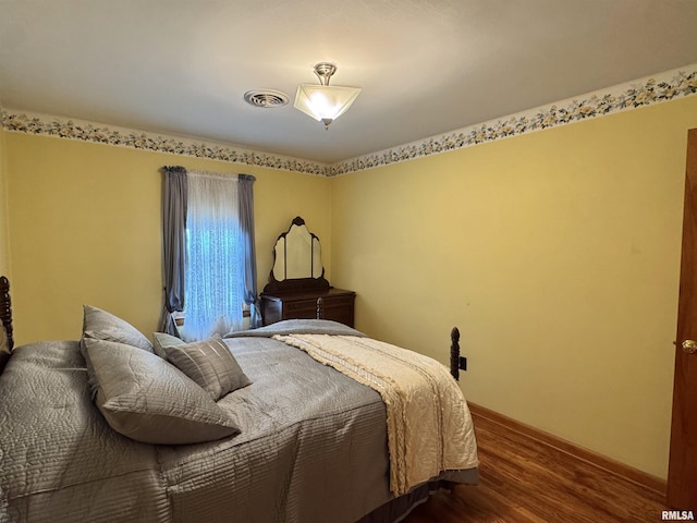 161 Hawkinson Ave, Galesburg, IL 61401 - bedroom with dark wood-style flooring