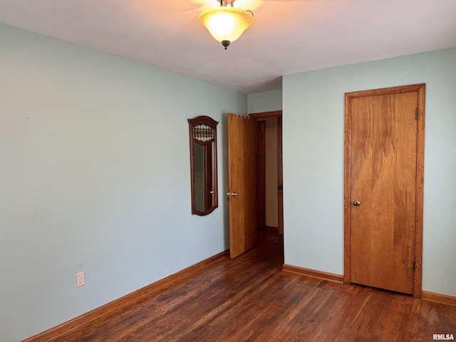 161 Hawkinson Ave, Galesburg, IL 61401 - unfurnished bedroom with wood finished floors and baseboards