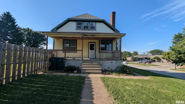 927 Sycamore St, Quincy, IL 62301 - view of front of property featuring covered porch and a chimney