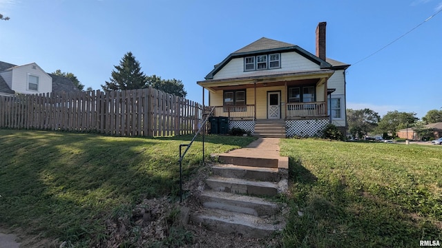 927 Sycamore St, Quincy, IL 62301 - view of front of home featuring a porch, a chimney, and stairway