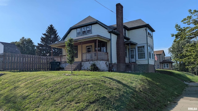 927 Sycamore St, Quincy, IL 62301 - view of front of property featuring covered porch and a chimney