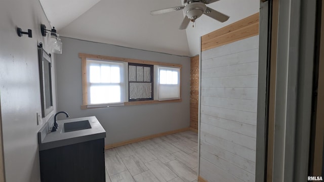 927 Sycamore St, Quincy, IL 62301 - interior space featuring vaulted ceiling, ceiling fan, and light countertops