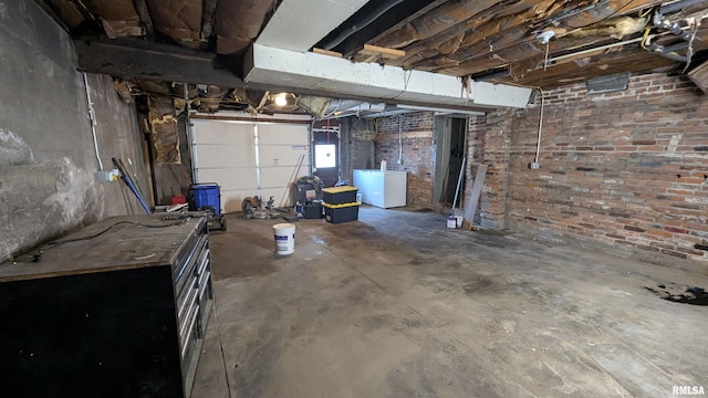 927 Sycamore St, Quincy, IL 62301 - basement featuring a garage and washer / dryer