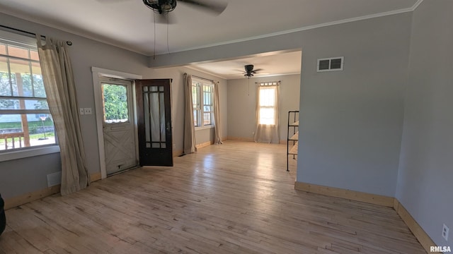 927 Sycamore St, Quincy, IL 62301 - entryway with a ceiling fan, crown molding, and wood finished floors