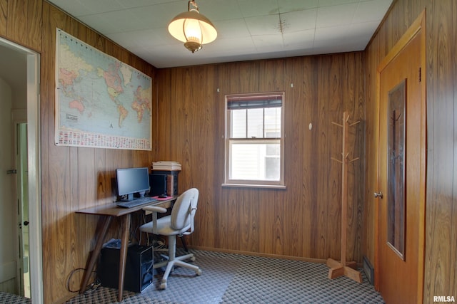 2716 Elm St, Quincy, IL 62301 - carpeted office with wooden walls and baseboards