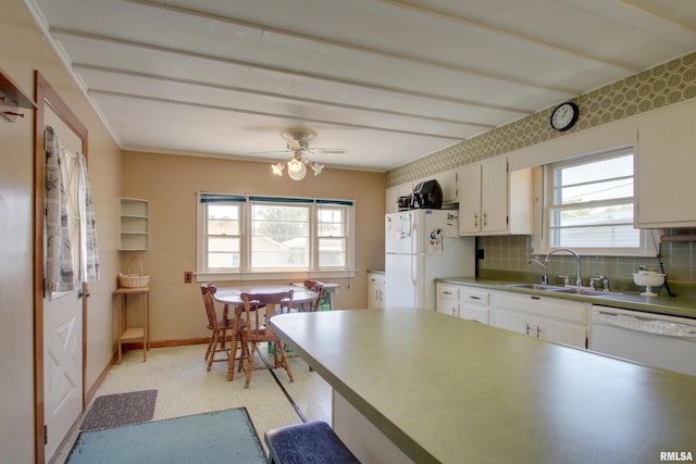 2716 Elm St, Quincy, IL 62301 - kitchen featuring white appliances, backsplash, and white cabinets