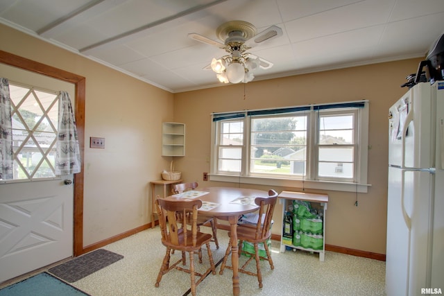 2716 Elm St, Quincy, IL 62301 - dining room featuring a ceiling fan and crown molding