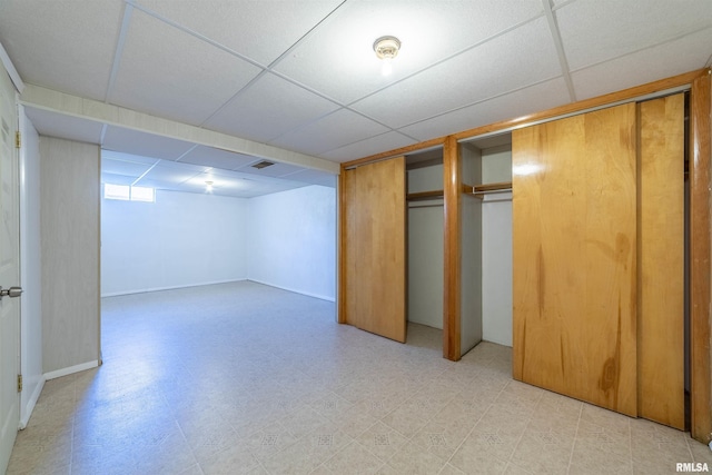 2700 Northridge Dr, Quincy, IL 62301 - unfurnished bedroom featuring a drop ceiling, light flooring, and a closet