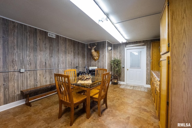 23490 E Maple Rd, Bluford, IL 62814 - dining space with wooden walls and light flooring