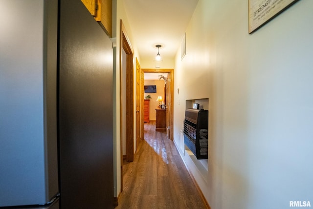 23490 E Maple Rd, Bluford, IL 62814 - hall with wood finished floors and heating unit
