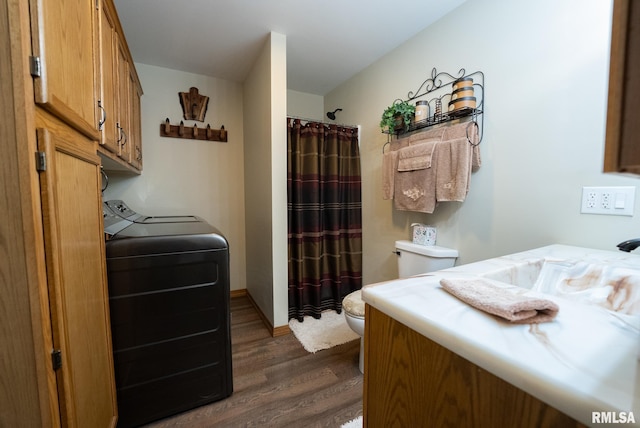 23490 E Maple Rd, Bluford, IL 62814 - laundry area featuring washing machine and dryer and dark wood-type flooring