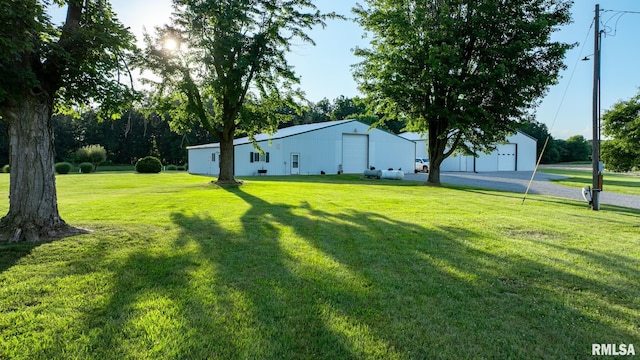 23490 E Maple Rd, Bluford, IL 62814 - view of green lawn featuring an outdoor structure