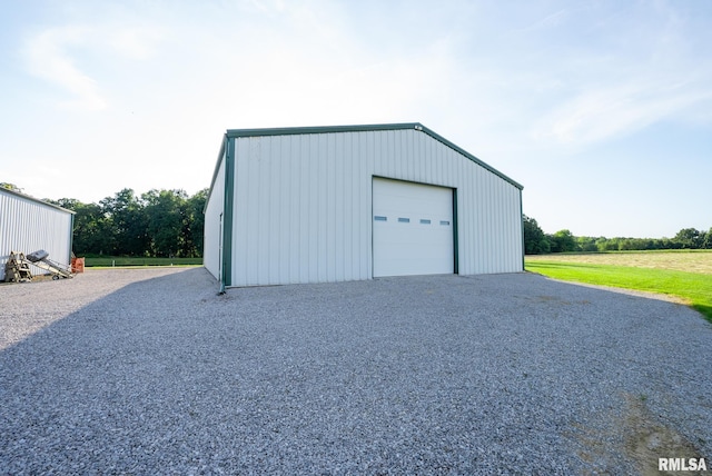 23490 E Maple Rd, Bluford, IL 62814 - detached garage featuring gravel driveway
