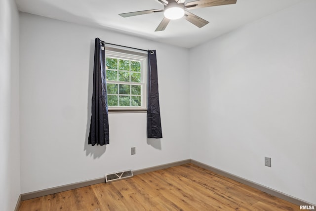 1717 Melview Rd, Quincy, IL 62305 - empty room with light wood-type flooring and a ceiling fan