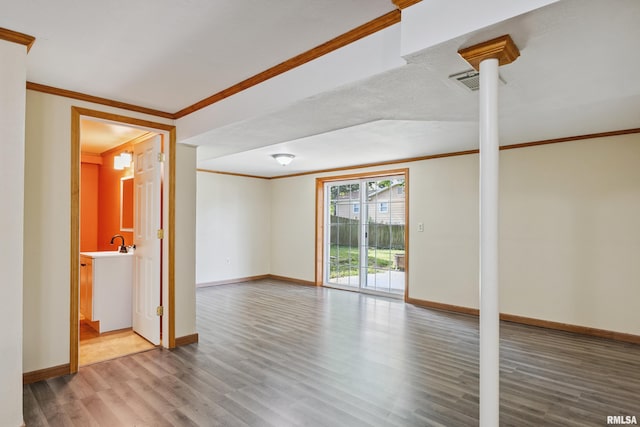 1717 Melview Rd, Quincy, IL 62305 - empty room featuring crown molding and wood finished floors