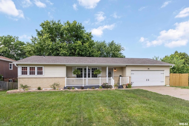 1717 Melview Rd, Quincy, IL 62305 - ranch-style house featuring a porch, brick siding, an attached garage, and concrete driveway
