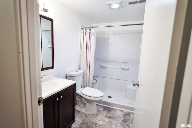29498 420th St, Griggsville, IL 62340 - bathroom featuring vanity, curtained shower, and stone finish flooring