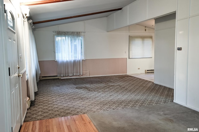 29498 420th St, Griggsville, IL 62340 - empty room with lofted ceiling, carpet floors, and baseboard heating