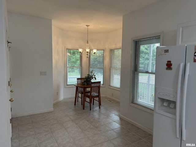 4004 Abbey Ridge St, Quincy, IL 62305 - dining room with a chandelier and baseboards
