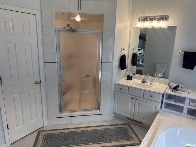 4004 Abbey Ridge St, Quincy, IL 62305 - full bathroom featuring a stall shower, vanity, tile patterned floors, and a bath