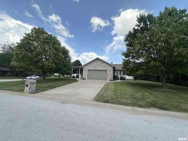 4004 Abbey Ridge St, Quincy, IL 62305 - ranch-style house with an attached garage, a front yard, and concrete driveway