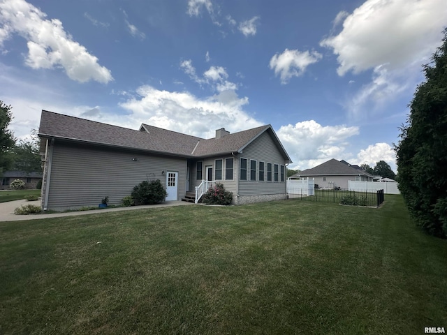 4004 Abbey Ridge St, Quincy, IL 62305 - back of house featuring a chimney and roof with shingles