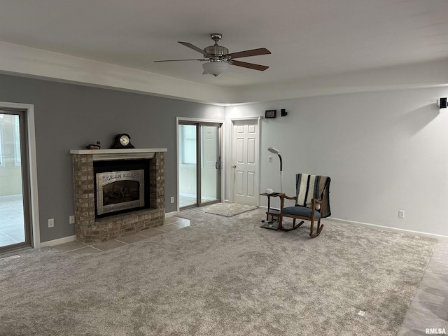 4004 Abbey Ridge St, Quincy, IL 62305 - unfurnished room with a ceiling fan, a fireplace, and carpet flooring