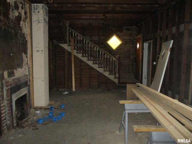 basement with a fireplace