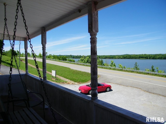 exterior space with a water view