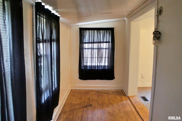 unfurnished room with dark hardwood / wood-style floors