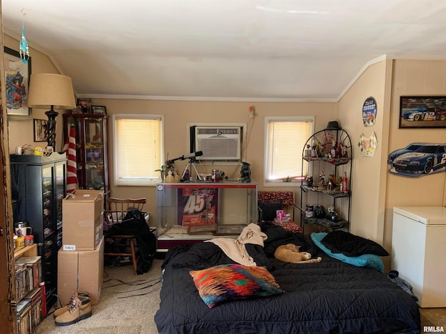 bedroom featuring carpet flooring, white fridge, and a wall mounted air conditioner