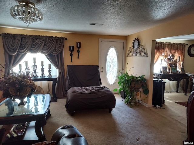 living room featuring plenty of natural light and carpet floors