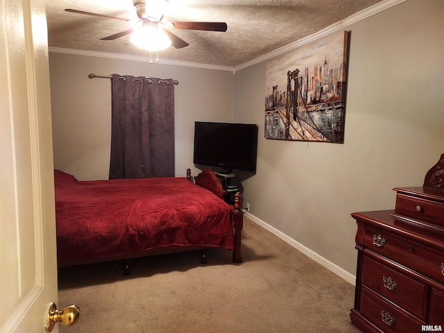 bedroom with crown molding, a textured ceiling, carpet flooring, and ceiling fan