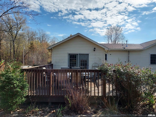 rear view of house with a deck