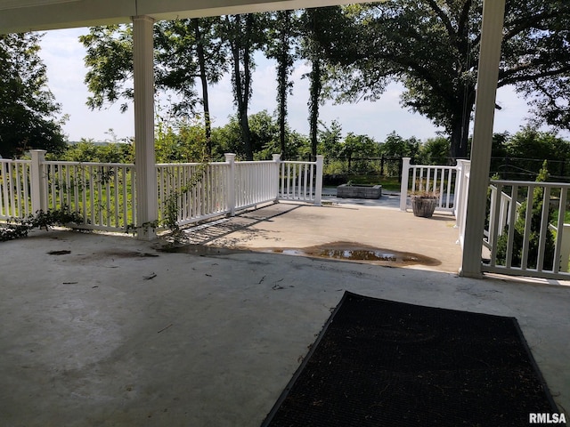 view of patio / terrace with an outdoor fire pit