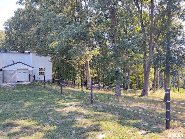 view of yard with a garage