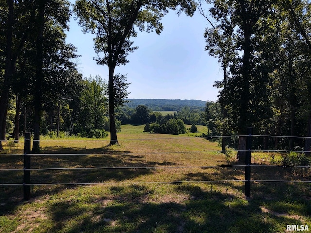 property view of mountains with a rural view