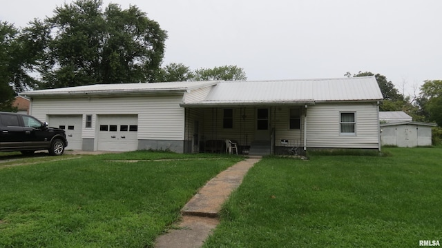 single story home with a front lawn and a garage