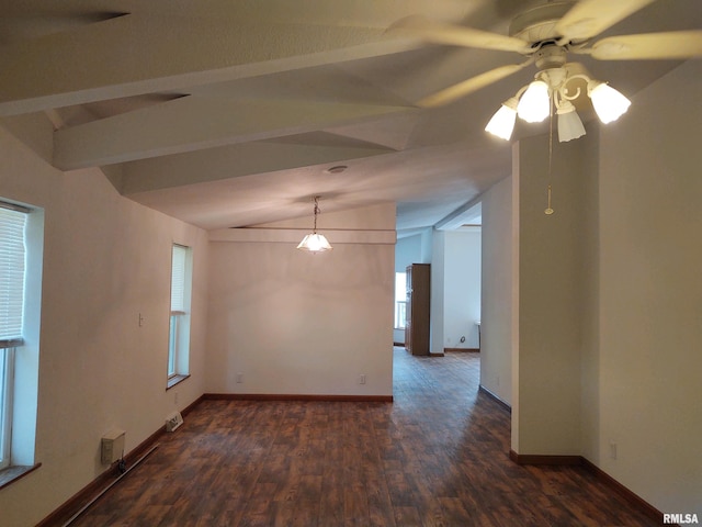 spare room featuring ceiling fan, dark wood-type flooring, and lofted ceiling with beams