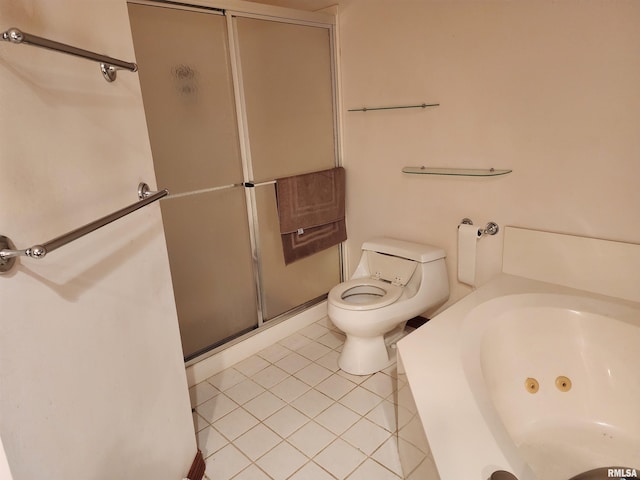 bathroom featuring tile patterned flooring, shower with separate bathtub, and toilet