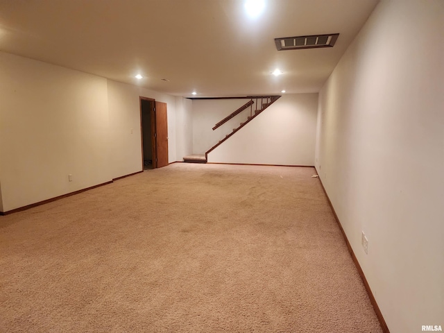 basement with light carpet