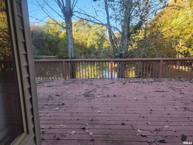 wooden deck with a water view