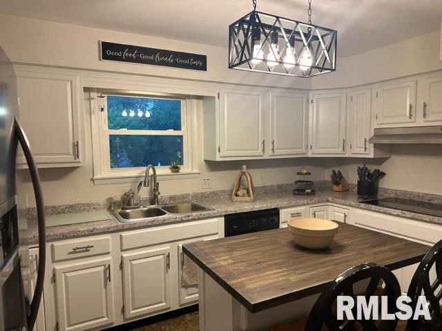 kitchen featuring white cabinets, sink, pendant lighting, and black appliances