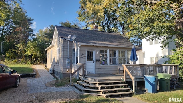 view of front of house featuring a deck