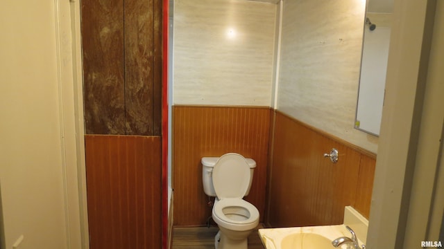 bathroom featuring toilet