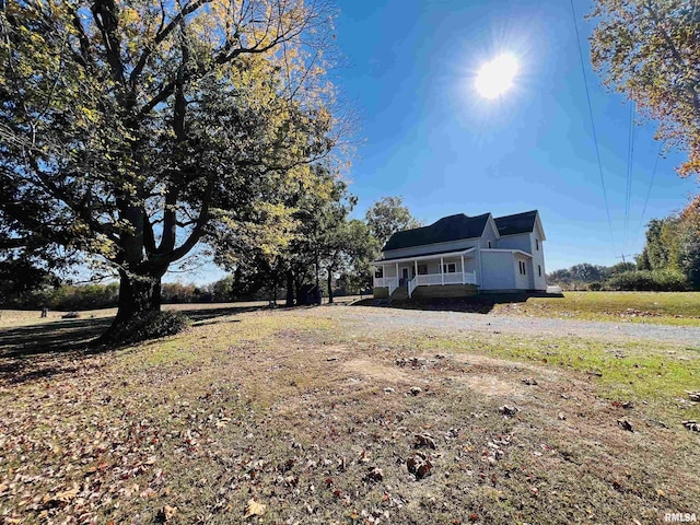 view of yard with a porch