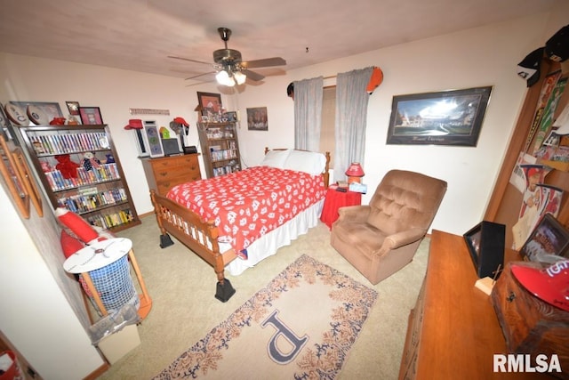 bedroom featuring ceiling fan and carpet floors